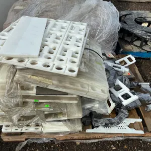 Pallet of White Plastic Brackets and Parts