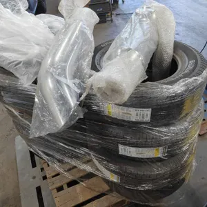 Pallet of Tires, Exhaust Stacks and Headlights, New/Old Stock