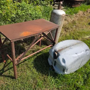 22” x 44” x 36” Metal Work Bench, 100lb Propane Cylinder (Old Style) and Plastic Barrel