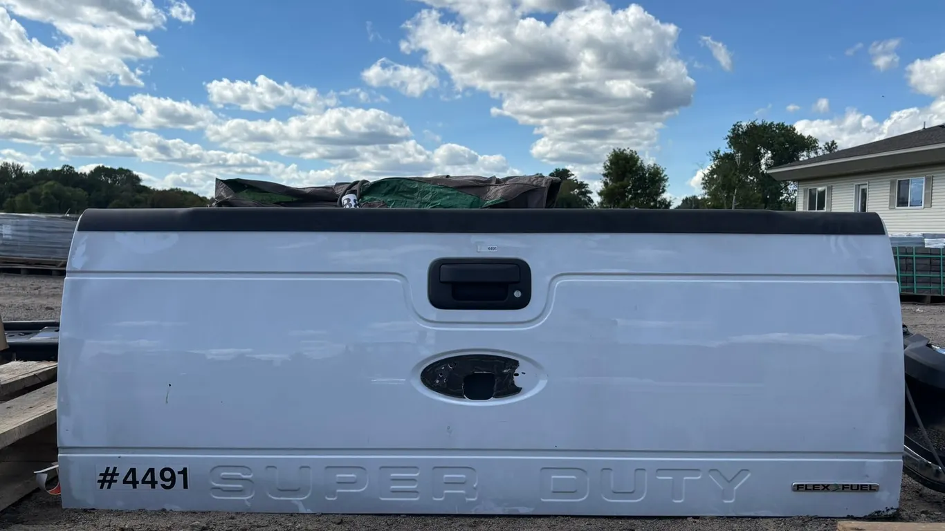 White Ford Super Duty Tailgate