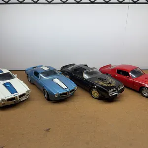 Four Pontiac Firebird & Trans Am Die-Cast Model Cars
