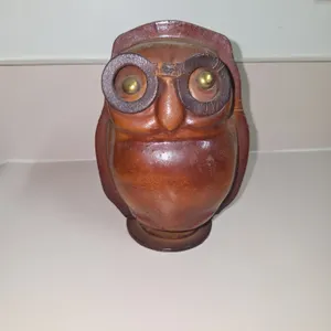 Vintage all leather piggy bank with brass eyes