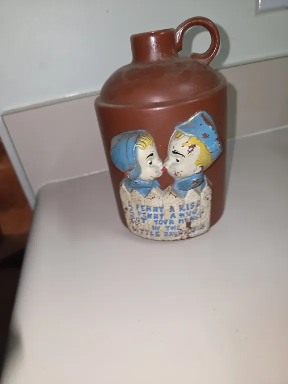 Vintage Little Brown Jug Piggy BANK with Kissing Dutch Girl & Boy