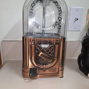 Vintage carousel, copper and glass gumball machine.