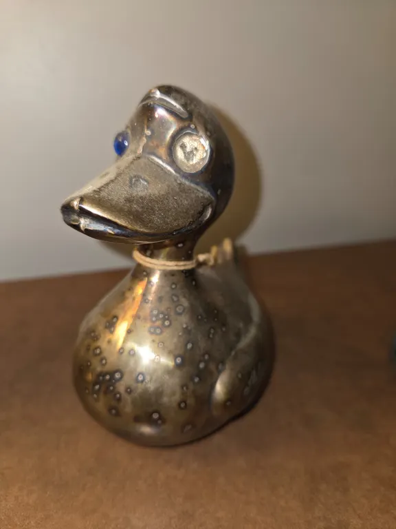 Vintage brass duck, missing eye coin bank 6" NO KEY