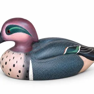 The Boyds Collection, specifically a classic green-winged teal drake signed by G. Lowenthal and date