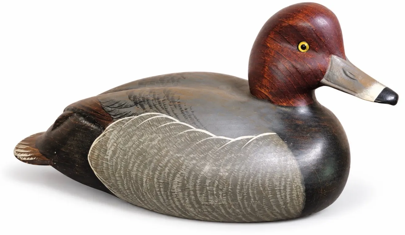 Redhead drake duck decoy Ducks Unlimited medallion and the signature of carver Bob Bolle