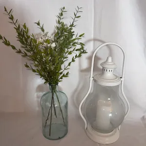 Glass lantern and bottle decorations