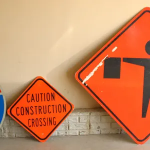 Three Metal Road and Construction Signs