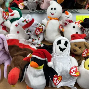 A Collection of Ty Beanie Babies. (Ty, 1990s) An assortment of holiday-themed and novelty plush Beanie Babies, including snowmen, ghosts, Christmas be
