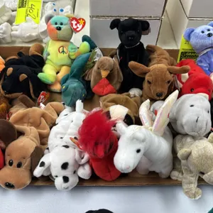 A Collection of Ty Beanie Babies Plush Toys. (Ty, 1990s-2000s) An assortment of 21 Ty Original Beanie Babies featuring Peace bear, Snort the bull, Dot