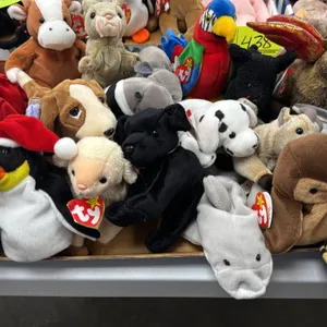 A Collection of Ty Original Beanie Babies. (Ty, 1990s) An assortment of twenty original plush Beanie Babies featuring various animals including a drag