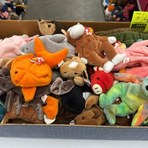 A Collection of Ty Original Beanie Babies. (Ty, 1990s-2000s) An assortment of plush beanbag animals including bears, aquatic life, reptiles, and safar