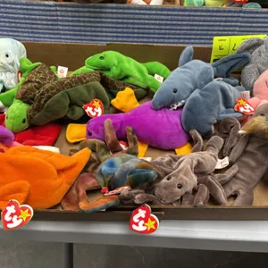 A Collection of Ty Original Beanie Babies. (Ty, 1990s) A collection of sixteen original plush Beanie Babies featuring primarily aquatic and amphibian 