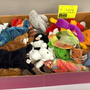 A Collection of Ty Original Beanie Babies. (Ty, 1990s) A collection of assorted original Ty Beanie Babies plush animals, including Grunt, Claude, Wise