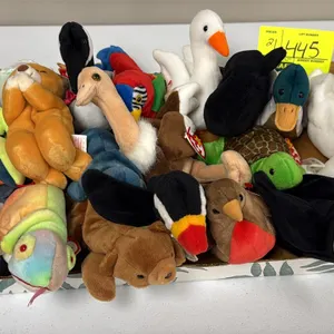A Collection of Ty Original Beanie Babies. (Ty, 1990s) An assortment of plush figures including Stretch the ostrich, birds, bears, and other animals. 