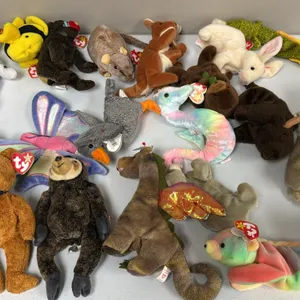 A Collection of Ty Original Beanie Babies. (Ty, 1990s) A collection of assorted plush figures including Eucalyptus the koala, Scorch the dragon, and o
