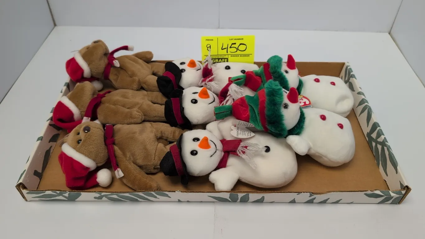 A Collection of Holiday Ty Beanie Babies. (Ty, 1997-2000) A group of 9 Ty Original Beanie Babies plush toys, including (3) 1997 Teddy bears with Santa