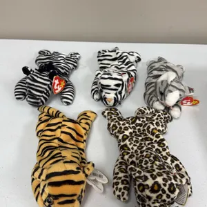 A Collection of Ty Beanie Babies Plush Toys. (Ty, 1990s) A set of five animal print plush figures including Stripes the tiger, Freckles the leopard, Z