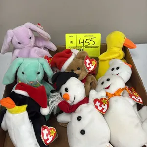 A Collection of Ty Original Beanie Babies. (Ty, 1990s) An assortment of plush figures including Zero the penguin, holiday bear, snowmen, bunnies, a ch