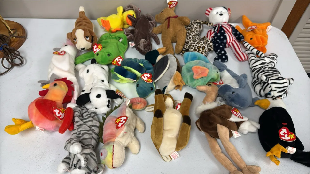 A Collection of Ty Original Beanie Babies. (Ty, 1990s) A collection of assorted plush figures including Iggy the iguana, Baldy the eagle, Stretch the