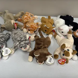 A Collection of Ty Original Beanie Babies Cats. (Ty, 1990s) A set of plush feline Beanie Babies featuring various cat styles including Snip (Style 412
