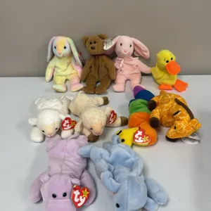 A Collection of Ty Original Beanie Babies. (Ty, 1990s) An assortment of ten plush Beanie Babies including Happy the hippo, Peanut the elephant, Inch t