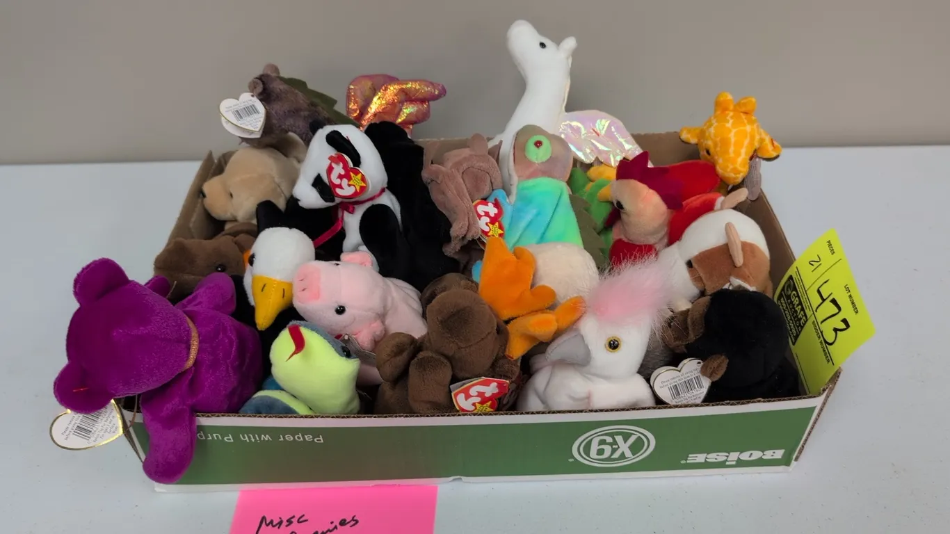 A Collection of Ty Original Beanie Babies. (Ty, 1990s-2000s) An assortment of original Ty Beanie Babies plush animals, including Millennium bear, Fort