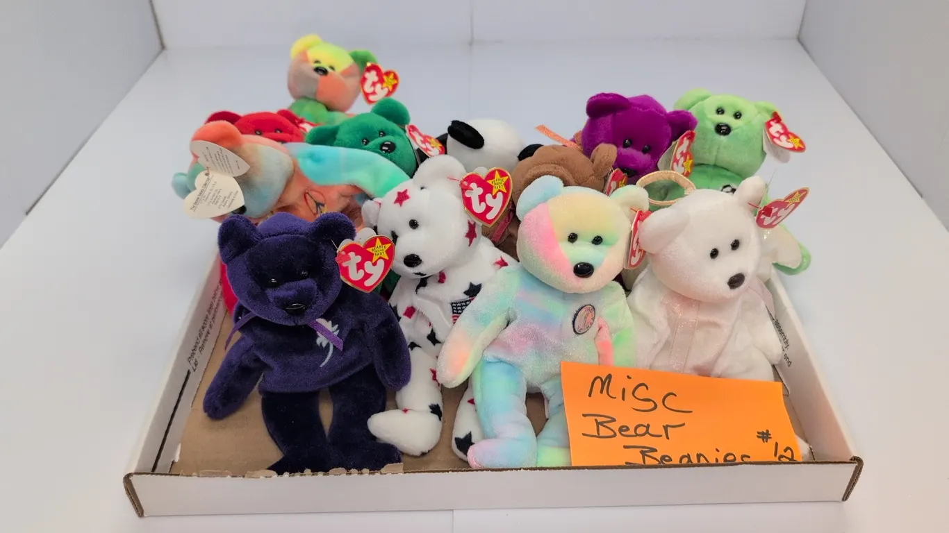 A Collection of Ty Beanie Babies Plush Bears. (Ty, 1990s-2000s) A collection of original Ty Beanie Babies plush bears including Peace, Princess, Halo,