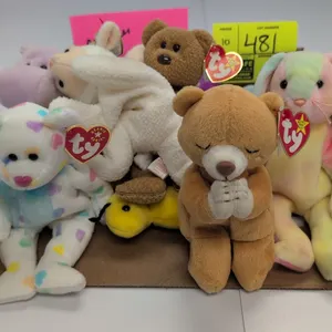 A Collection of Ty Original Beanie Babies. (Ty, 1990s) A collection of ten assorted original Beanie Babies plush toys, including Inch the worm, Hope t
