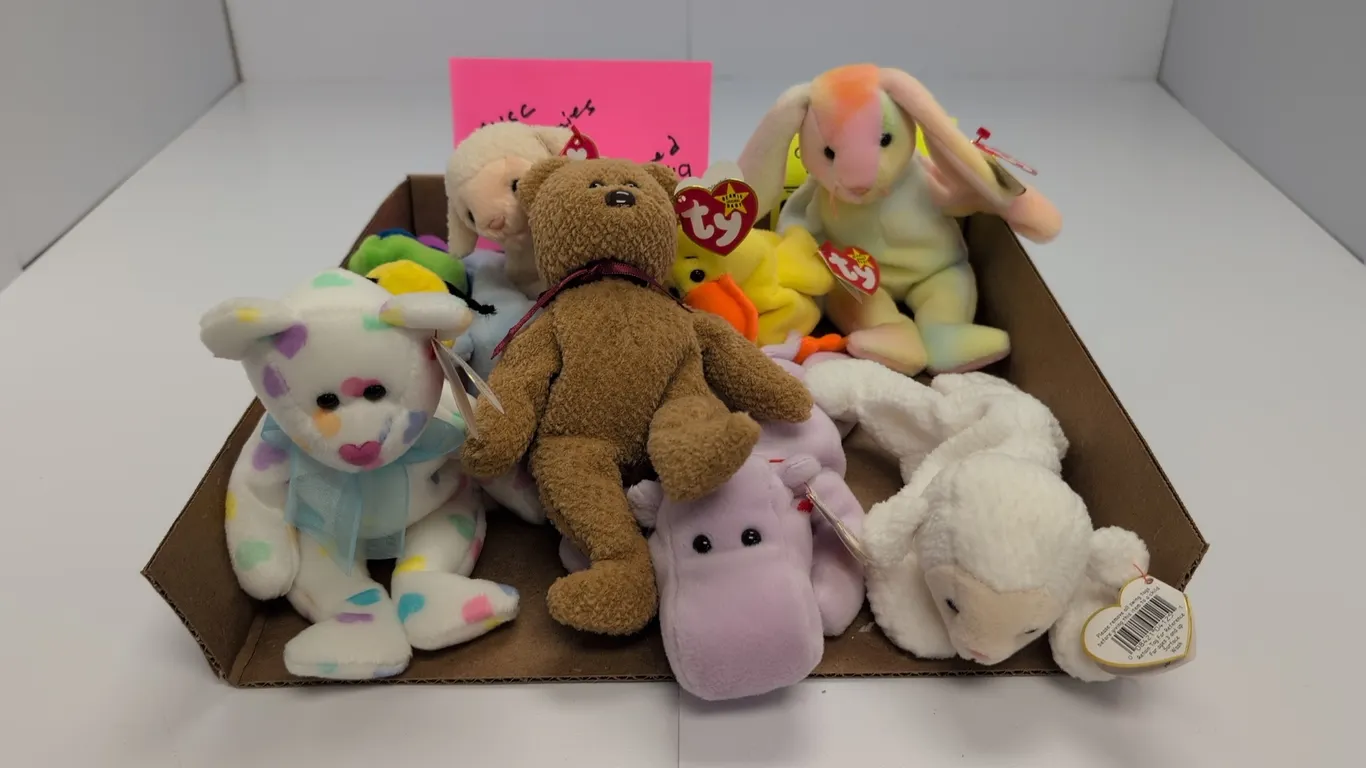 A Collection of Ty Original Beanie Babies. (Ty, 1990s) A 9-piece assortment of plush Beanie Babies, including Inch the worm, Happy the hippo, Hippity