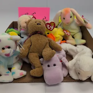 A Collection of Ty Original Beanie Babies. (Ty, 1990s) A 9-piece assortment of plush Beanie Babies, including Inch the worm, Happy the hippo, Hippity 
