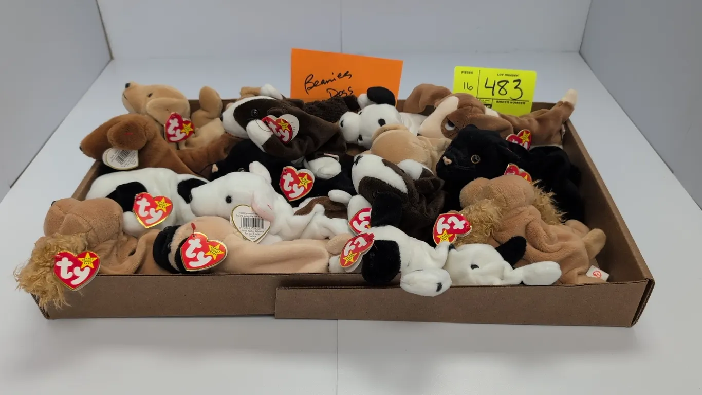 A Collection of Ty Beanie Babies Dog Plush Toys. (Ty, 1990s) An assortment of plush dogs from The Beanie Babies Collection, including Pugsly and Dotty