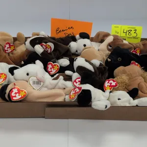 A Collection of Ty Beanie Babies Dog Plush Toys. (Ty, 1990s) An assortment of plush dogs from The Beanie Babies Collection, including Pugsly and Dotty
