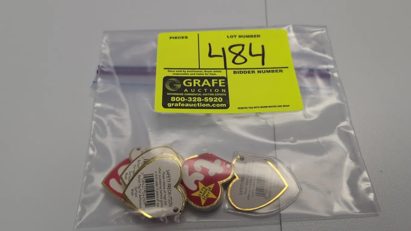 A Collection of Ty Beanie Babies Hang Tags. (Ty, 1990s) An assortment of Ty Beanie Babies heart tags, featuring an authentic "Clubby" tag dated 1998,