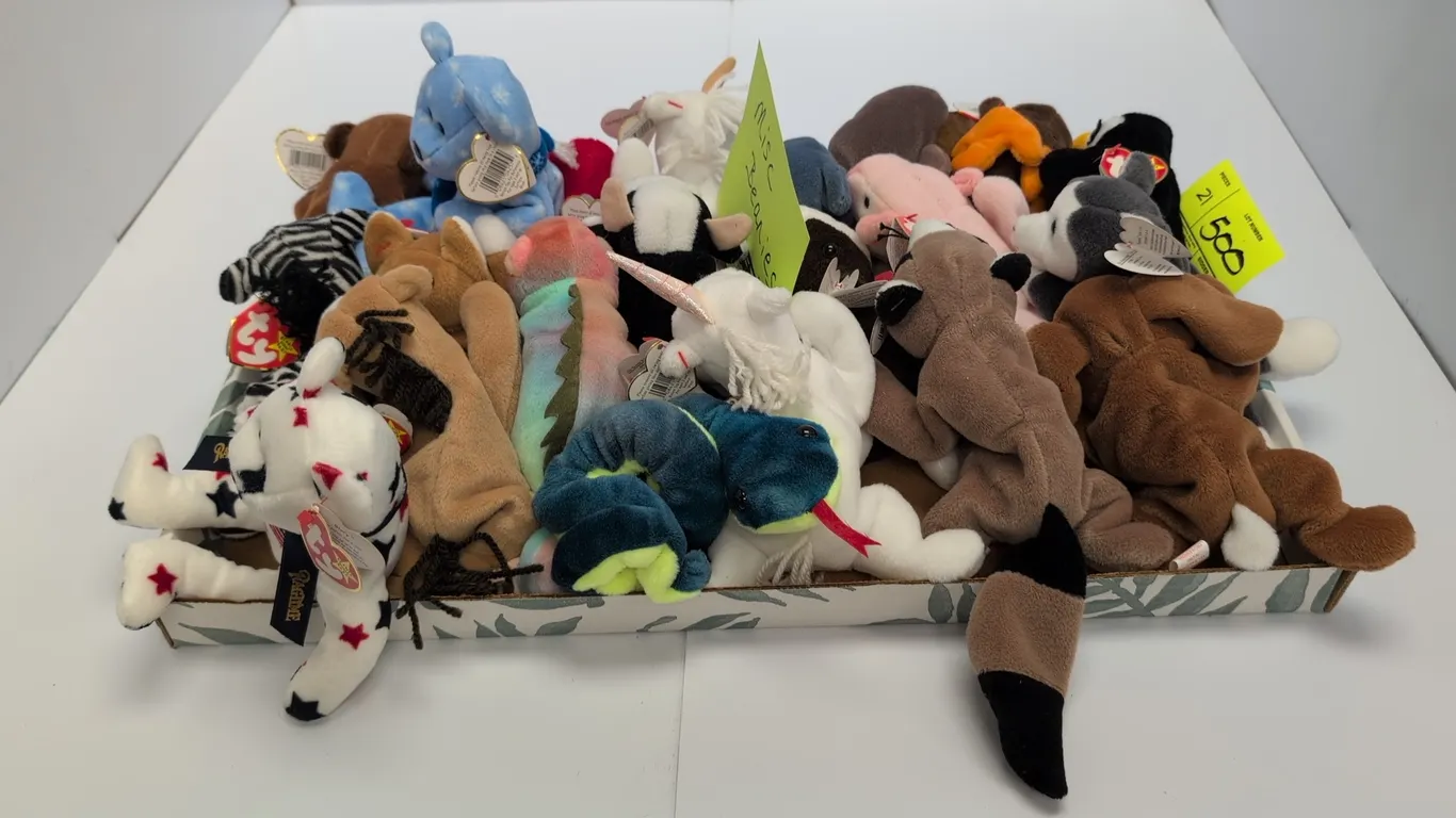 A Collection of Ty Beanie Babies. (Ty, 1990s) An assortment of Ty Original Beanie Babies plush animals, including Rover, Ziggy, Mystic, Ringo, and Puf