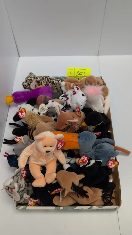 A Collection of Ty Original Beanie Babies. (Ty, 1990s) An assortment of plush Beanie Babies including Lizzy the lizard, Pouch the kangaroo, Batty the