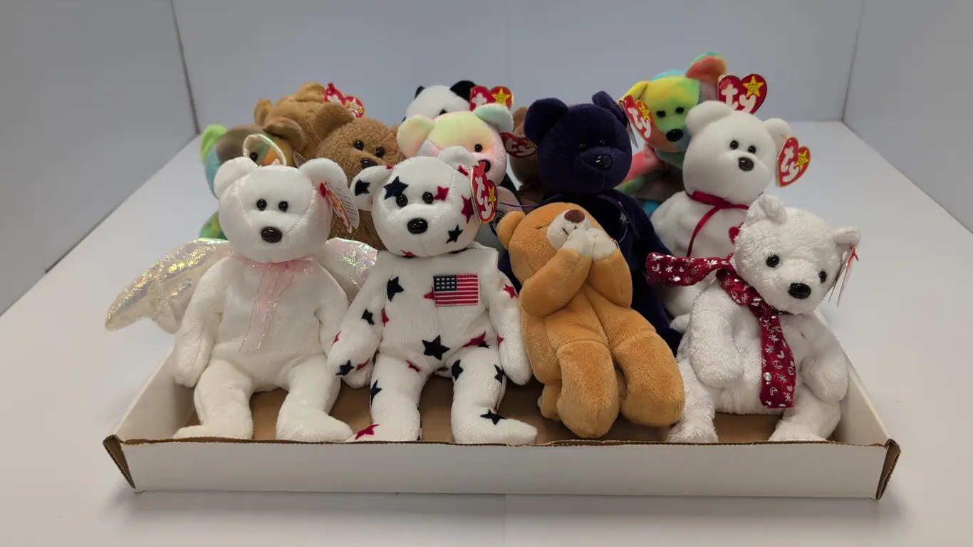 A Collection of Ty Beanie Babies Bears. (Ty, 1990s-2000s) A collection of 12 Ty Beanie Babies bear plush toys, including Valentino, Halo, Spangle, and