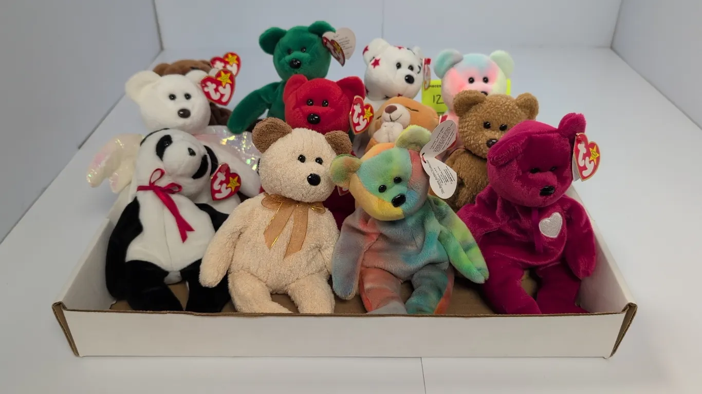 A Collection of Ty Beanie Babies Bears. (Ty, 1990s) A 12-piece assortment of plush bears featuring original heart hang tags, including Valentina, Fort