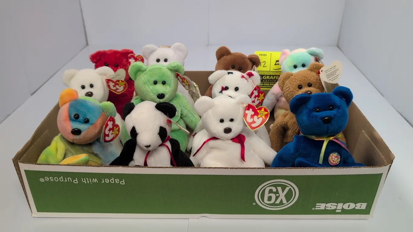 A Collection of Ty Original Beanie Babies Bears. (Ty, 1990s) An assortment of bear plush toys including Fortune, Curly, and others, featuring plush fa