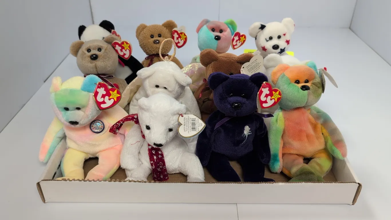 A Collection of Ty Original Beanie Babies Bears. (Ty, 1990s-2000s) A collection of plush bears including Princess, Garcia, Halo, and 1999 Signature Be