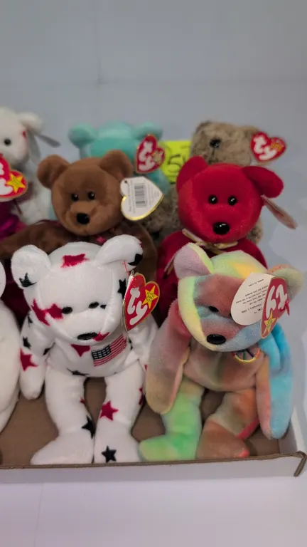 A Collection of Ty Original Beanie Babies Bear Plush Figures. (Ty, 1990s) A collection of 12 Ty Beanie Babies bear plush figures, including Valentino,