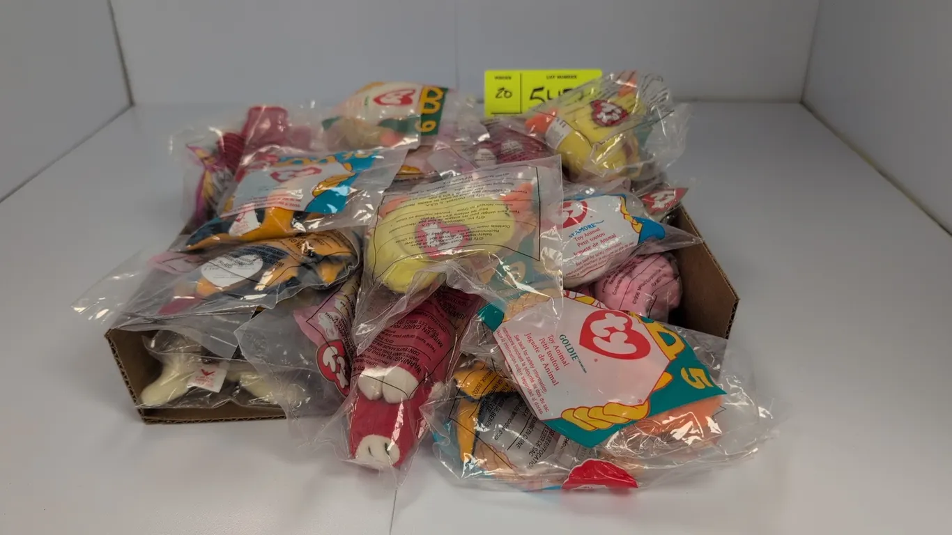 A Collection of Ty McDonald's Teenie Beanie Babies. (McDonald's/Ty, 1996) An assortment of miniature plush toy animals from the 1996 McDonald's Happy