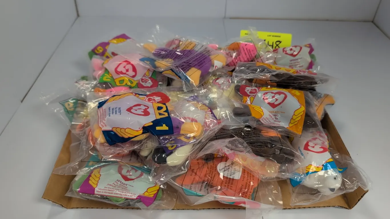 A Collection of Ty McDonald's Teanie Beanie Babies. (Ty/McDonald's, 1996) An assortment of promotional plush toy animals, including Chops, Patti, Choc