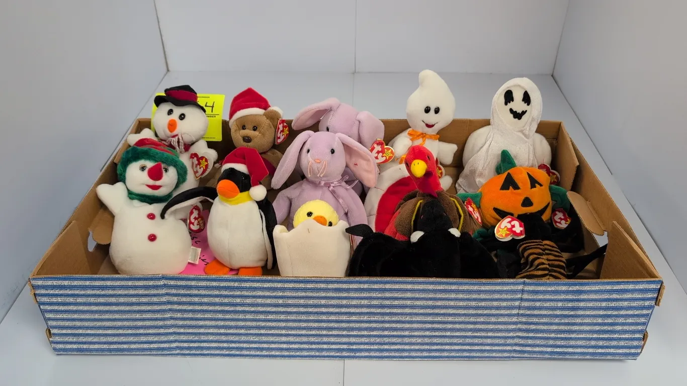 A Collection of Ty Holiday Beanie Babies. (Ty, 1990s) An assortment of holiday-themed plush Beanie Babies representing Halloween, Thanksgiving, Christ