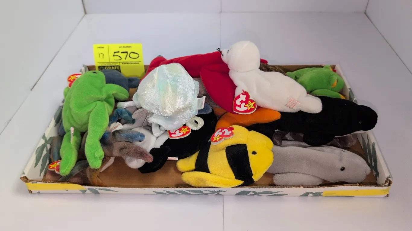 A Collection of Ty Beanie Babies. (Ty, 1990s) A collection of aquatic and amphibian-themed Beanie Babies plush toys, including Pinchers the lobster, C