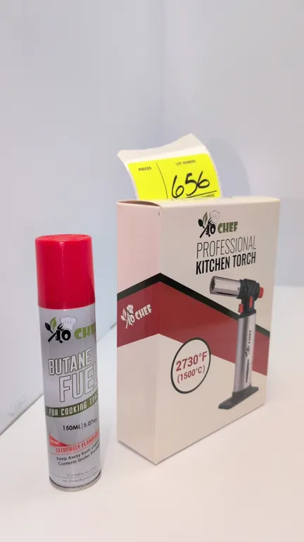 Jo Chef professional kitchen torch. Features adjustable flame control, safety lock, and a maximum flame temperature of 2730°F (1500°C). Includes one 1