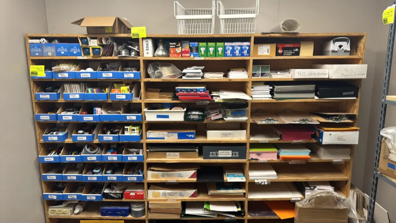 Custom wood multi-tier storage rack. Features plywood construction with three vertical sections and multi-tier divided sorting shelves and compartment