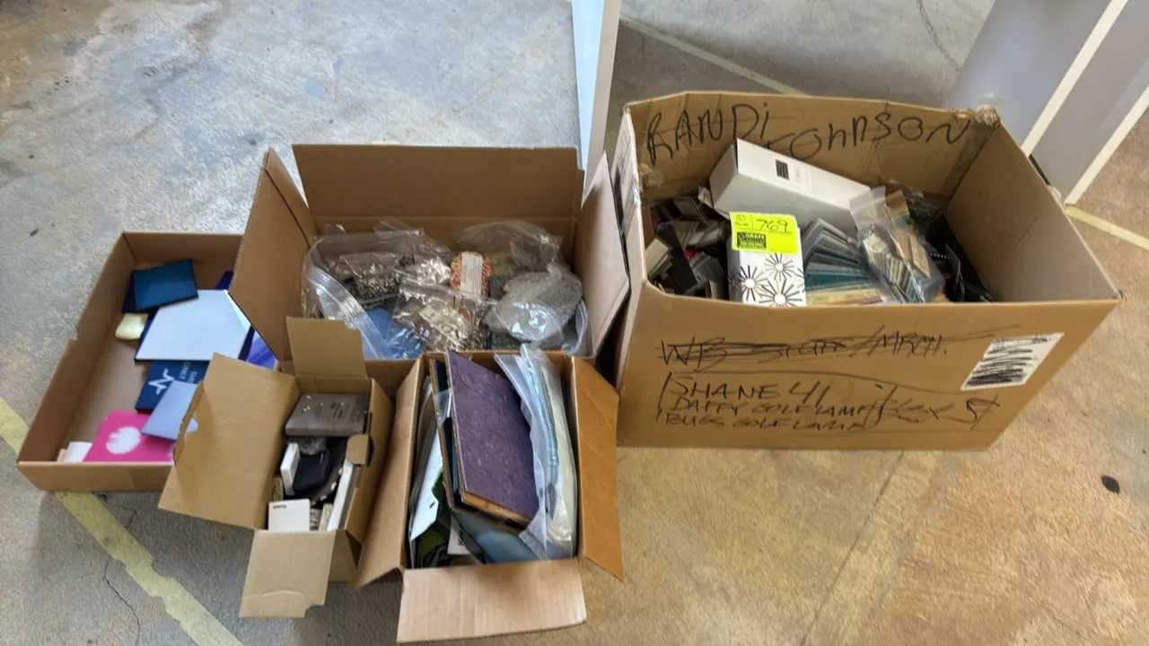 Assorted flooring, countertop, and architectural material samples in (5) boxes. Includes Corian and solid surface samples, laminate finish swatches, a