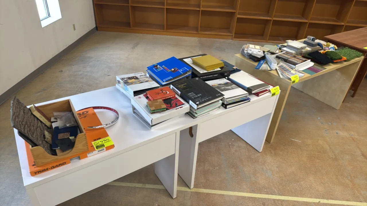 Assorted interior finish and architectural material samples. Includes sample binders, swatches, and display pieces from brands including Armstrong, Du